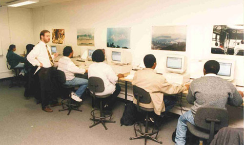 Richard Heeks teaching students IT skills in the 1990s