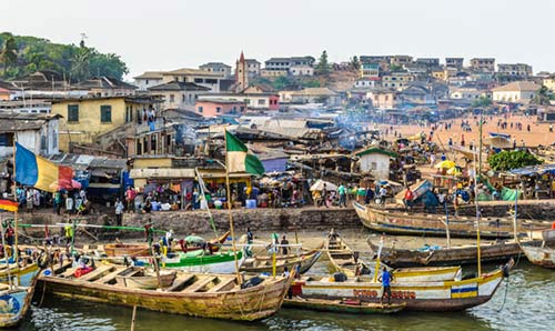 Boats on a river in a busy port