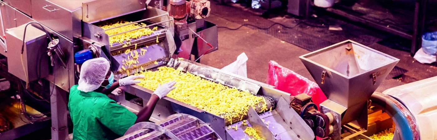 Factory worker and machinery
