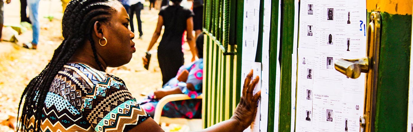 A voter checks for her name on the voter's list during Nigeria's 2019 General Election 