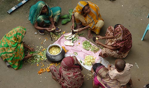 Women preparing food.