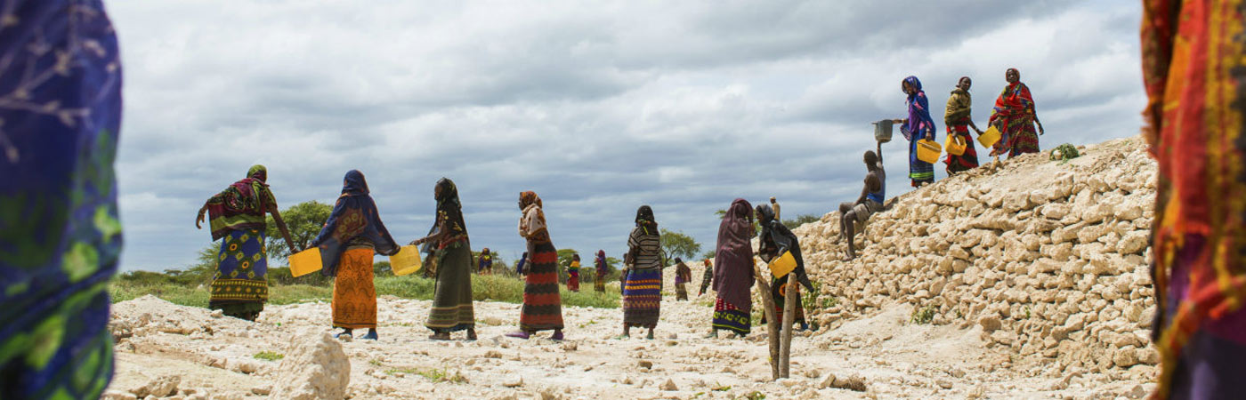 Women going to collect water in a drought.